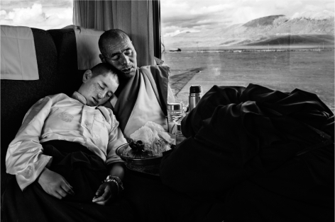 Laurent Zylberman, A Journey in Tibet, Monks resting in the T-27 train, 2008, Sous Les Etoiles Gallery
