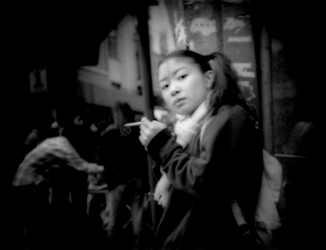 James Whitlow Delano, Mangaland, Pony tails, piercing glance and a cigarette, Shibuya, Tokyo, Japan, 1998, Sous Les Etoiles Gallery