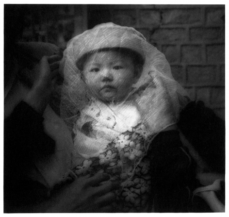 James Whitlow Delano, Empire, Impressions from China, Veiled infant, Gansu Province, China, 1994, Sous Les Etoiles Gallery